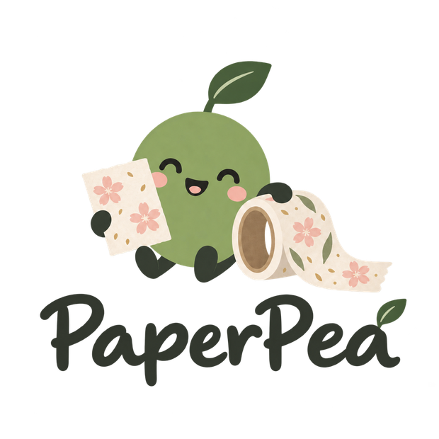 The PaperPea character holding patterned paper and a roll of washi tape
